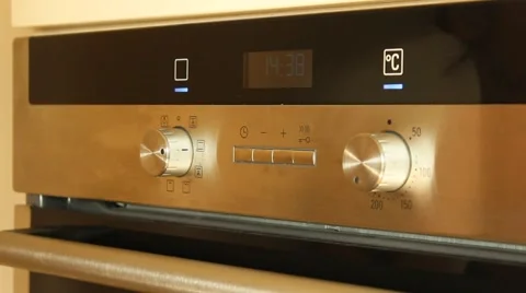Setting time of an electric Stove Stock Footage 55512087