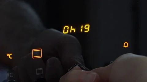 Setting the timer on an oven to 20 minutes Stock Footage 73255055