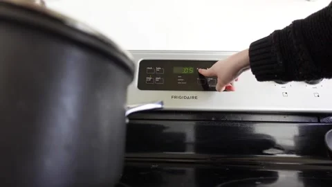 Setting Timer On Oven Stock Footage 147833808
