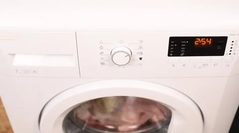 Setting Washing Maching on Digital Display by Woman Finger Stock Footage 60033026