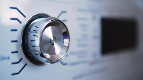 Setting washing program to the right option and pressing the button start Stock Footage 124771743