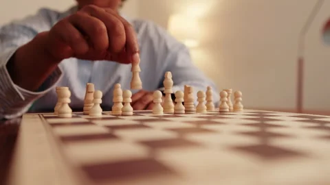 Setting Up White Chess Pieces on a Board Stock Footage 314628269