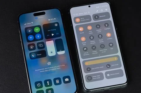 Settings of iphone and android on home screen Stock Photos