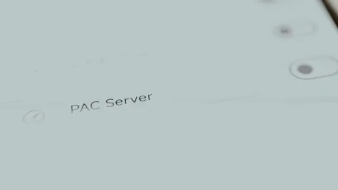 Settings menu for configuring a PAC Server on a device, user switches the toggle Stock Footage 329748365
