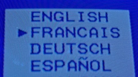 Settings menu on an old TV. Language setting. Blue pixel background. Retro tv Stock Footage 146187959