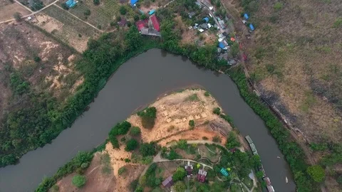 A settlement close to a river Stock Footage 111622097
