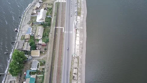 Settlement On A Dam Surrounded By Water. Stock-Footage 317075793