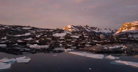 Settlement revealed by light of sunset in eastern Greenland Stock Footage 138243652