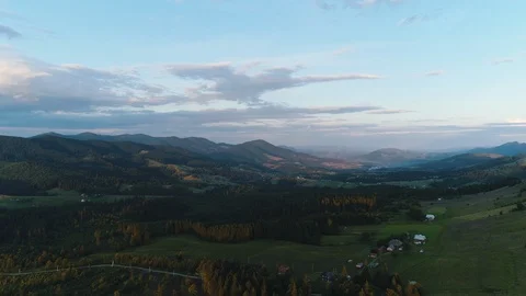 Settlement in the valley of mountains aerial view Stock Footage 118619171