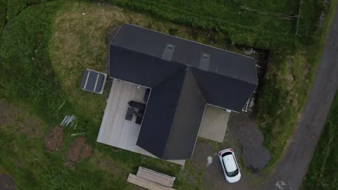 Settlement of Vikarbyrgi with 4 houses on the dramatic Faroe Islands coastline. Stock Footage 340168072