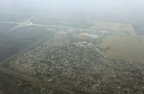 Settlement from the window of the aircraft. Stock Photos