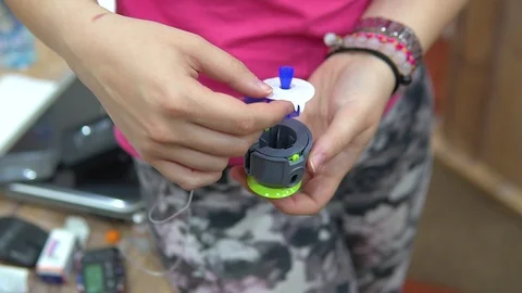 Setup a insulin pump infusion set Stock Footage 126319224