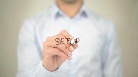 Setup,  Man writing on transparent screen Stock Photos