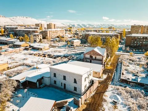 Sevan town aerial fly over panorama in winter. One of the most popular reso.. Stock Photos