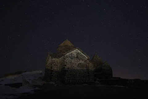 Sevanavank on the background of the night starry sky. Stock Photos
