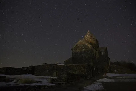 Sevanavank on the background of the night starry sky. Stock Photos