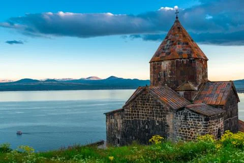Sevanavank Monastery and Lake Sevan. Dramatic sky at sunset, Armenia Stock Photos