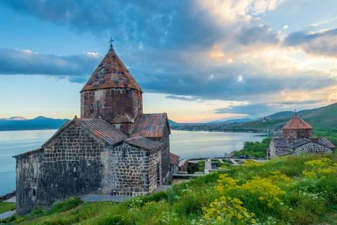 Sevanavank Monastery in the summer at sunset, dramatic sky over Lake Sevan, A Stock Photos