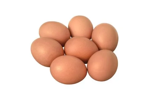 Seven brown eggs Stock Photos