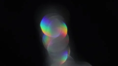 Seven-color bokeh stacked vertically on black Vídeo Stock 317456379