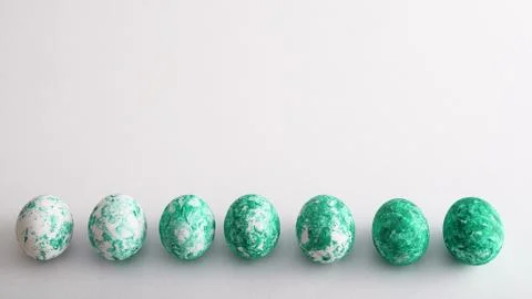 Seven Easter eggs with green pattern and gradient effect in row on white back Stock Photos