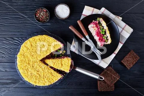 Seven layered cake salad on a plate Stock Photos