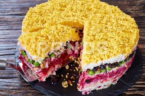 Seven layered salad on a black tray Stock Photos