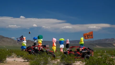Seven Magic Mountains and desert buggy near Las Vegas Video stock 106731064