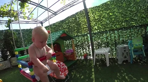 Seven-month toddler for the first time Stock Footage 64866462