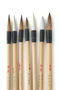 Seven oriental brushes Stock Photos