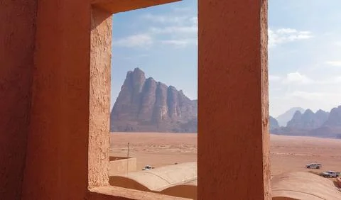 Seven Pillars of Wisdom seen from a window. Beautiful rock formation on ent.. Stock Photos