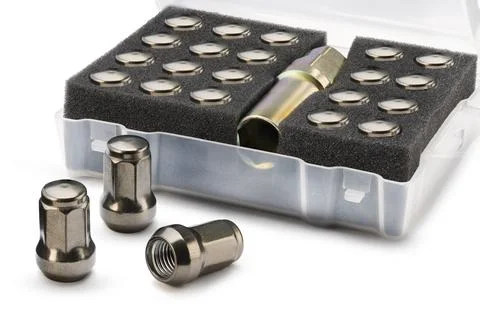Seven-sided wheel nuts a set of mounting bolts isolate on a white background Foto stock