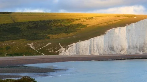 Seven Sisters chalk cliffs at dusk, South Downs, Sussex, England. Camera pan. Stock-Footage 82903127