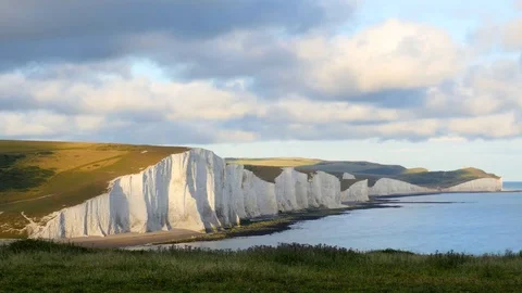 Seven Sisters chalk cliffs in evening light, South Downs, East Sussex, England. 動画素材 82903928