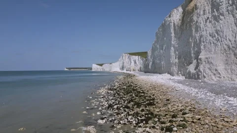 Seven Sisters drone flight below cliffs, East Sussex, UK Stock Footage 242999815