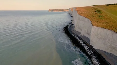 Seven Sisters flight going west towards Cuckmere Haven, Eaast Sussex UK Stock Footage 247118698