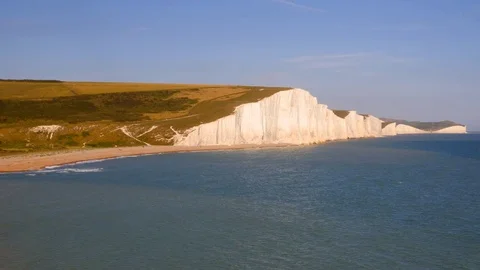 Seven Sisters white chalk cliffs during high tide, East Sussex, England. Stock Footage 82905544