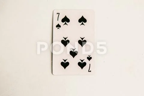 Seven of Spades playing card, white background. Stock Image #143652031