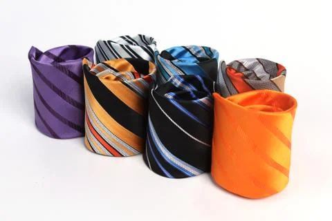 Seven ties on the white background Stock Photos