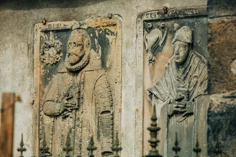Seventeenth-century epitaph of two noble townspeople on stone in church, Euro 스톡 사진