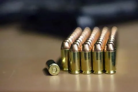 Several ammunition (projectiles) with the calibration 40 lined up Stock Photos