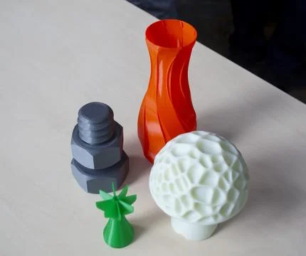 Several art multi-colored objects printed 3D printer Model vase white mushroom Stock Photos