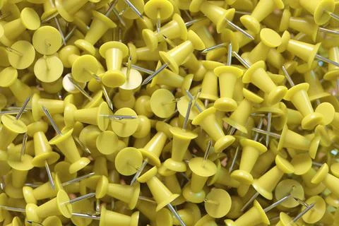 Several assorted colors of plastic push pins Stock Illustration