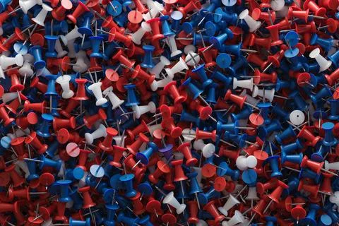 Several assorted colors of plastic push pins Stock Illustration