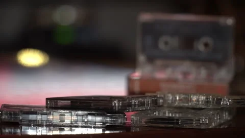 Several audio tapes against a background of moving graphics Video stock 250289473