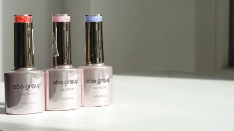 Several bottles of Aba Group Gel polish getting stacked. Stock Footage 201203721