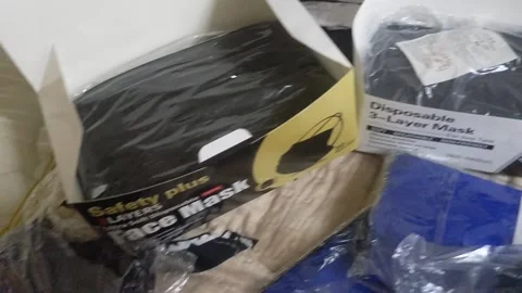 Several boxes of face coverings for use. Stock Footage 247386539