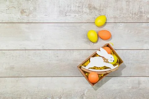 Several bright color dyed easter eggs on wooden background Stock Photos