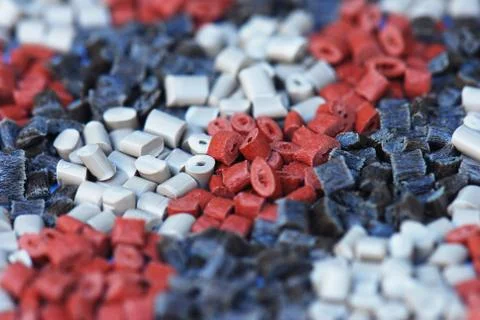 Several brown plastic granulates Stock Photos
