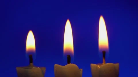 Several candles burn Stock Footage 237294749